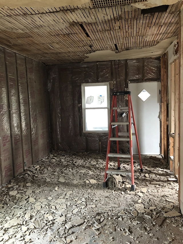 Interior home demolition in progress.