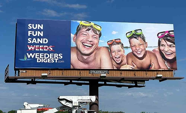 Billboard that says: Sun Fun Sand Weeds, and Weeds is crossed out.
